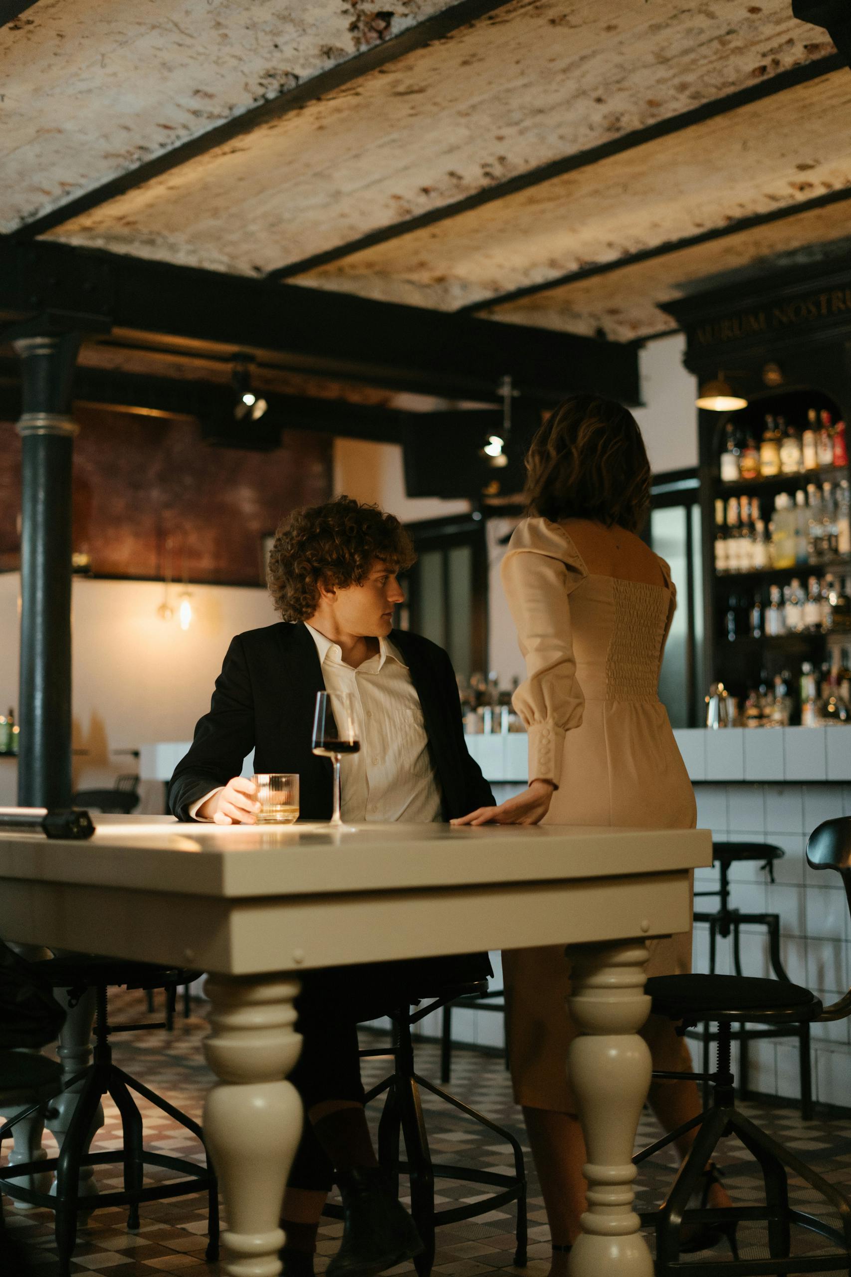 Man and Woman Sitting at Table